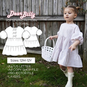 May include: A PDF sewing pattern for a tiered dress with puffed sleeves. The pattern includes a tutorial and is available in sizes 12 months to 12 years. The pattern is available in A4/US Letter, A0 Copy Shop, Projector, and Layers formats.