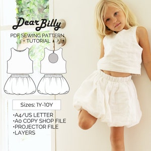 May include: A PDF sewing pattern for a white crop top and bubble skirt for children. The pattern includes sizes 1 to 10 years old. The pattern is available in A4/US Letter, A0 copy shop, projector, and layered formats.