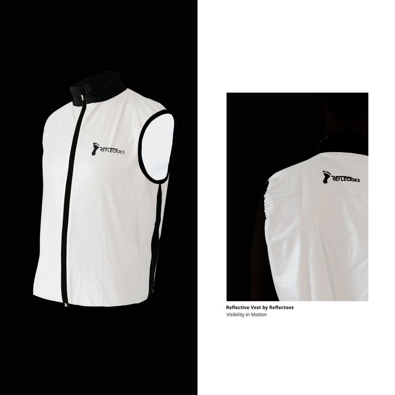 May include: White reflective vest with black trim and a black collar. The vest has a zipper closure and a logo on the chest and back that says "Reflectoes". The vest is designed for visibility.