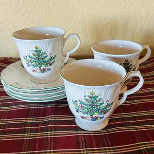 Nikko Japan ‘Happy Holidays’ Christmas Glazed Ivory Ceramic Tea Cups & Saucers - Set Of 3 Cups And 4 Saucers