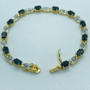 Silver Gold Plated 7 1/2” Long, Oval Blue Sapphire & Diamond Bracelet