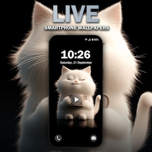 May include: A white cat with closed eyes is holding a cup of coffee. The cat is on a black background with a play button in the center. The image is on a smartphone screen with the time 10:26 and the date Saturday, 21 September displayed. The text "LIVE SMARTPHONE WALLPAPERS" is at the top of the image.