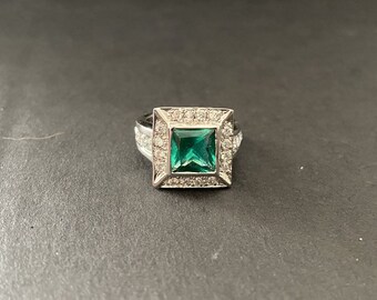 Stunning square cut emerald and cubic zirconia art deco ring