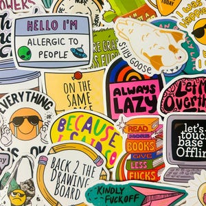 May include: A collection of colorful stickers with various designs and text. Some stickers feature phrases like "Hello I'm Allergic to People," "Always Lazy," and "Back 2 the Drawing Board." Other stickers have illustrations of a goose, a computer, and a stack of books.