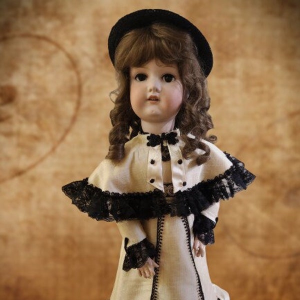 27 inch Armand Marseille Bisque doll in custom silk Victorian gown and cape.