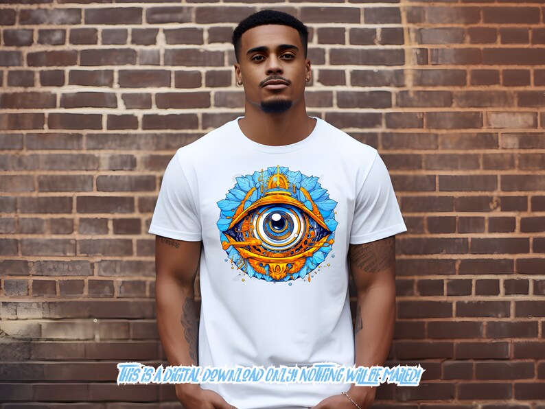 May include: A white t-shirt with a graphic of a blue and gold eye with intricate details. The eye is surrounded by a blue and gold floral design.