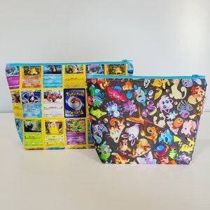 May include: Two zippered pouches with Pokemon character designs. The larger pouch has a yellow background with images of Pokemon cards. The smaller pouch has a black background with a variety of colorful Pokemon characters.