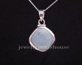 May include: A silver pendant necklace featuring a square, light blue gemstone. The gemstone is set in a silver frame and hangs from a delicate silver chain. The text "jewelrygemshouse" is visible on the pendant.