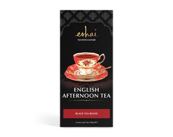 May include: A black box with gold lettering that reads "eshai TEA WITH CULTURE" and "ENGLISH AFTERNOON TEA BLACK TEA BLEND". The box features a red and gold illustration of a teacup and saucer.