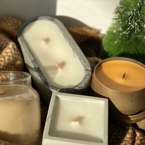 Firma mecha de madera de coco Cera de soja Serie de velas de lujo en recipiente de hormigón ovalado hecho a mano personalizado