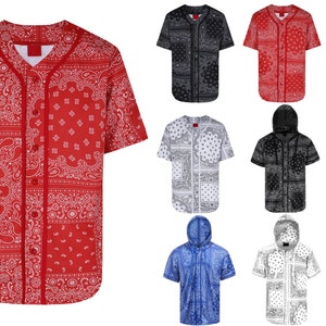 May include: A selection of short-sleeved baseball jerseys and hooded shirts featuring a paisley bandana design. The jerseys are available in red, black, blue, and white. The shirts have a button-up front and a V-neck.