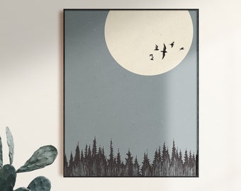 May include: A framed print of a minimalist landscape with a large white moon and a flock of birds flying over a dark forest silhouette against a blue sky.