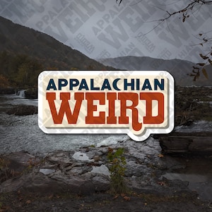 May include: A rectangular sticker with a white border featuring the text APPALACHIAN WEIRD in a bold, dark blue and orange font. The word APPALACHIAN is in dark blue, and the word WEIRD is in orange with a crescent moon icon in the letter C.