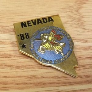 Vintage 1988 Nevada Motivating Tomorrow Foundation Pin / hat Lapel
