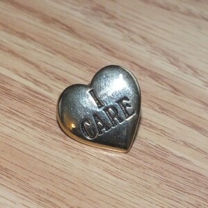 Gold Tone Vintage &quot;I Care&quot; Collectible Souvenir Shirt Lapel Pin