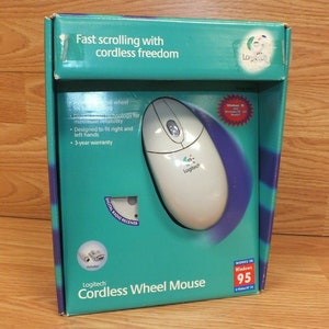 Vintage Logitech Cordless Fast Scrolling Wheel Mouse w/ Digital Radio Receiver