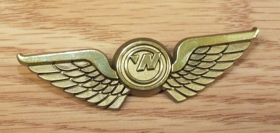 Vintage Northwest Airlines Gold Tone Plastic Stoffel Seals Jr