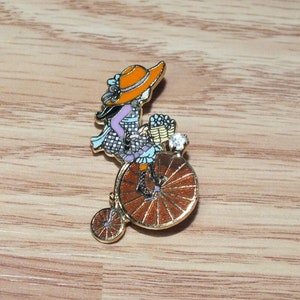 Vintage 1977 ROTH G. C. inc. Collectible Girl on Old Bicycle Lapel Pin