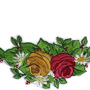 May include: Embroidered iron-on patch featuring a floral design with yellow and red roses, white flowers, and green leaves.