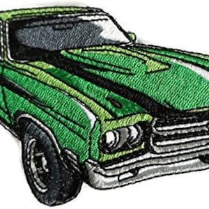 May include: Green muscle car with a black stripe down the hood. The car has a black grill and black wheels.
