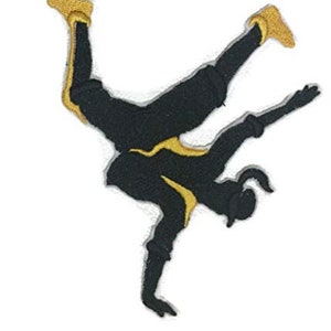 Peut inclure: Patch brodé thermocollant noir et or représentant une personne faisant un mouvement de breakdance.