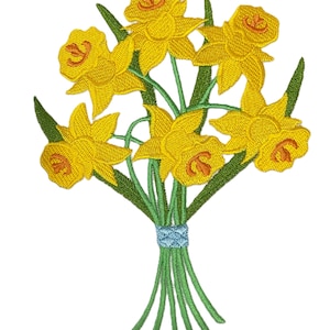 May include: Embroidered bouquet of yellow daffodils with orange centers and green stems. The flowers are tied together with a light blue ribbon. The image is on a white background.