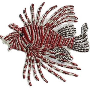 May include: Red and white embroidered lionfish patch. The lionfish has a detailed design with white stripes and red accents. The patch is perfect for adding a touch of nautical style to clothing, bags, or other accessories.