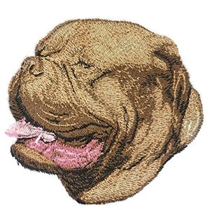 May include: Embroidered patch of a brown dog's head with a pink tongue sticking out. The dog's fur is detailed with brown and black stitching.