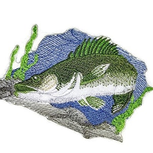 May include: Embroidered patch of a green and white fish swimming in blue water with green seaweed.