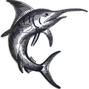 May include: A black and white embroidered patch of a marlin fish jumping out of the water. The marlin has a long, pointed bill and a dorsal fin.