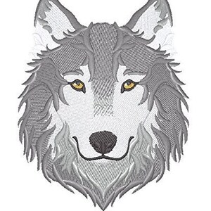 Puede incluir: Una cabeza de lobo gris bordada con ojos amarillos. El pelaje del lobo se representa con una textura esponjosa.