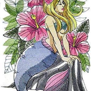 May include: Embroidered image of a mermaid with flowing blonde hair, a blue tail, and a pink and blue fin. She is surrounded by pink hibiscus flowers and green leaves. The mermaid is sitting on a gray rock.