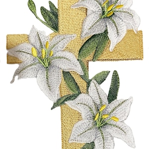 May include: A gold cross with three white lilies, each with yellow centers, and green leaves.