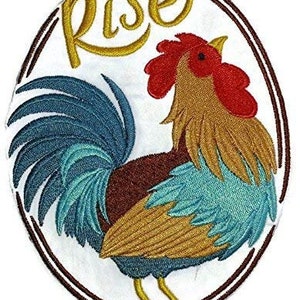 May include: Embroidered patch with a rooster and the word "Rise" in a gold script font. The rooster is brown, gold, and blue with a red comb.