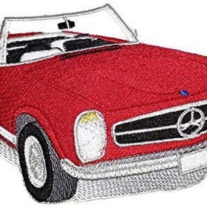 May include: Red convertible car with a black grill and chrome accents. The car has a white stripe along the side and a white bumper.