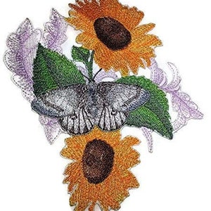 May include: Embroidered patch featuring a gray butterfly with black markings, surrounded by two yellow sunflowers and purple foliage.