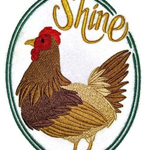 May include: Embroidered patch featuring a brown and gold chicken with a red comb, standing in a green oval frame with the word "Shine" in gold lettering.