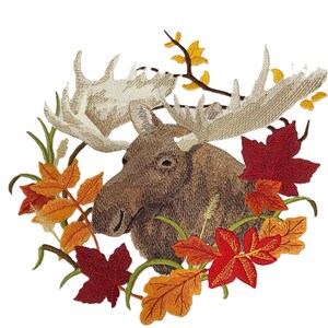 May include: Embroidered image of a moose with large antlers, surrounded by autumn leaves in shades of red, orange, and yellow. The moose has a brown coat and is set against a white background. The image is detailed and textured.