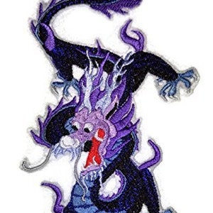 May include: Purple and blue embroidered dragon patch with a fierce expression. The dragon is in a standing position with its wings spread out.