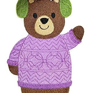 May include: A brown bear wearing a purple sweater with a chevron pattern and green earmuffs. The bear is smiling and has a black nose.