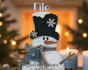 May include: A wooden snowman decoration with a black top hat, carrot nose, and twig arms. The snowman has a blue tag that says "Brrr" and the words "Let It Snow" at the base. The image also includes the text "SVG Laser File".