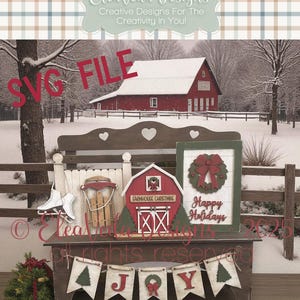May include: A festive winter scene with a red barn and snow-covered landscape. The display includes a banner spelling "JOY", a miniature red barn, and a sign that says "Farmhouse Christmas". The text "SVG FILE" is also visible.
