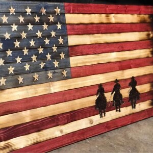 Bandera de madera de Tres Vaqueros