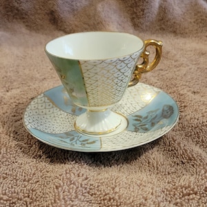 Vintage Green and White Teacup and Saucer With Mid Century Design