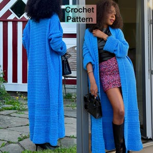 May include: A long, bright blue crochet cardigan with ribbed cuffs and a textured hem. The cardigan is knee-length and has a simple, open front design. The text "Crochet Pattern" is visible in the upper right corner.