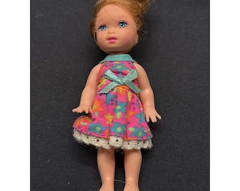 Vintage 1994 Mattel Inc. Mini Doll With Printed Dress & reddish Brown Hair Blue Eyes