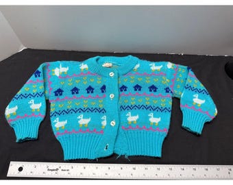 Cárdigan vintage para bebé de 12 a 18 meses, color turquesa, tejido de punto con estampado animal y botones, fabricado en Portugal.