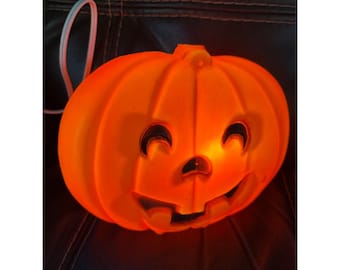 Decoración de Halloween con forma de calabaza iluminada vintage
