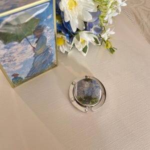 Bag Hook Portable, Foldable Hooks Hang On Table in Cafes, Restaurants & More!  &quot;Claude Monet Woman With A Parasol&quot;