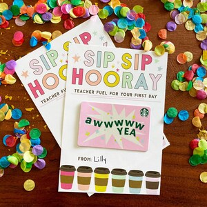 May include: A white rectangular card featuring the text SIP SIP HOORAY TEACHER FUEL FOR YOUR FIRST DAY and a pink gift card with the text AWWWWW YEA. The card includes a FROM: Lilly line and six colorful coffee cup illustrations at the bottom.